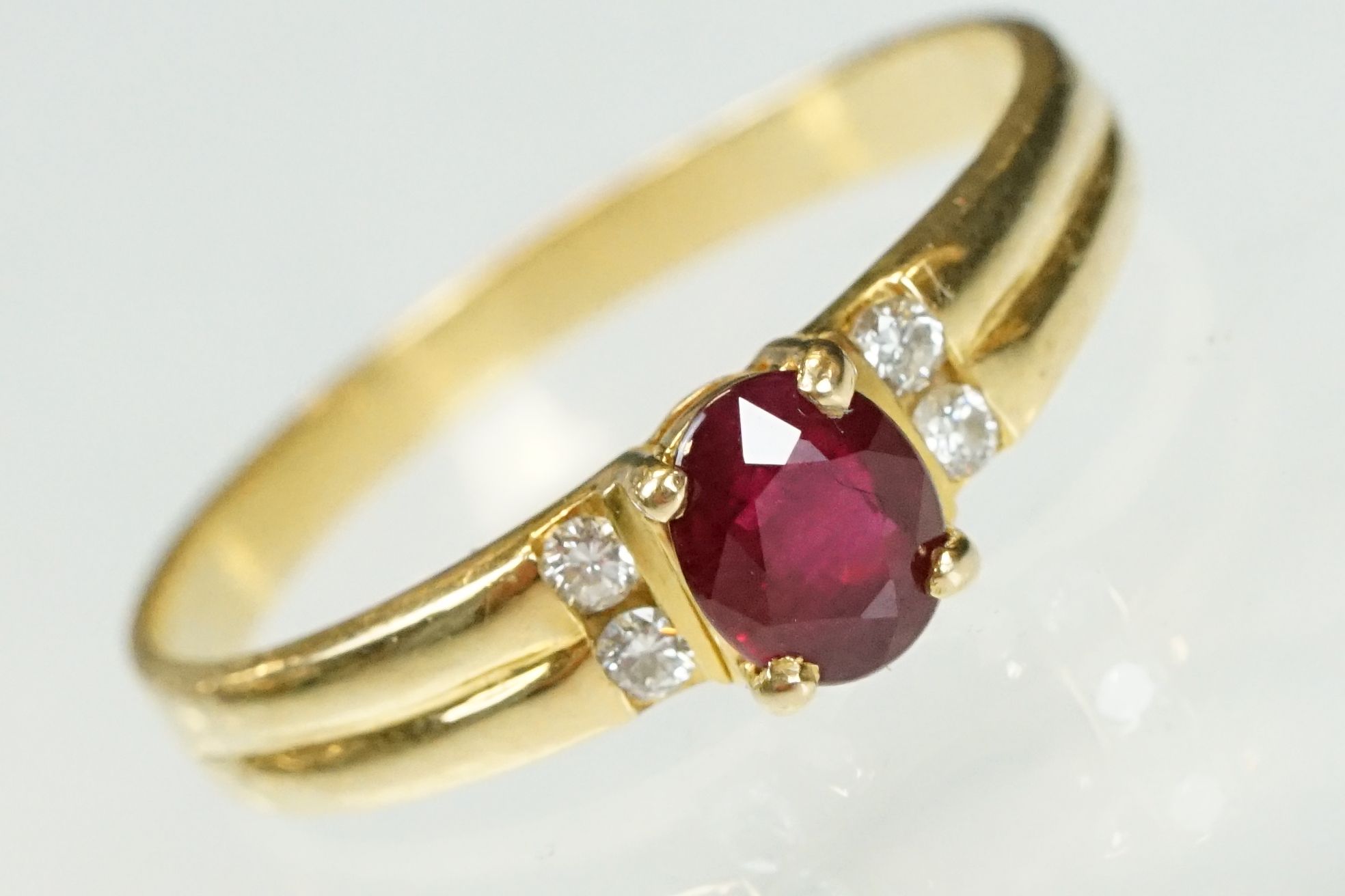 Ruby and diamond 18ct yellow gold ring, the oval mixed cut ruby measuring approx 5.5 x 4.5mm, claw - Image 4 of 23