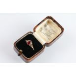 Early 20th Century Edwardian 9ct gold and ruby ring. The ring being bezel set with an oval mixed cut