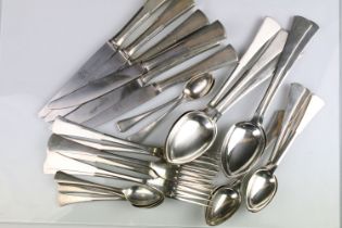 Silver cutlery set for six people consisting of three sixes of spoons, knives and forks. Each having