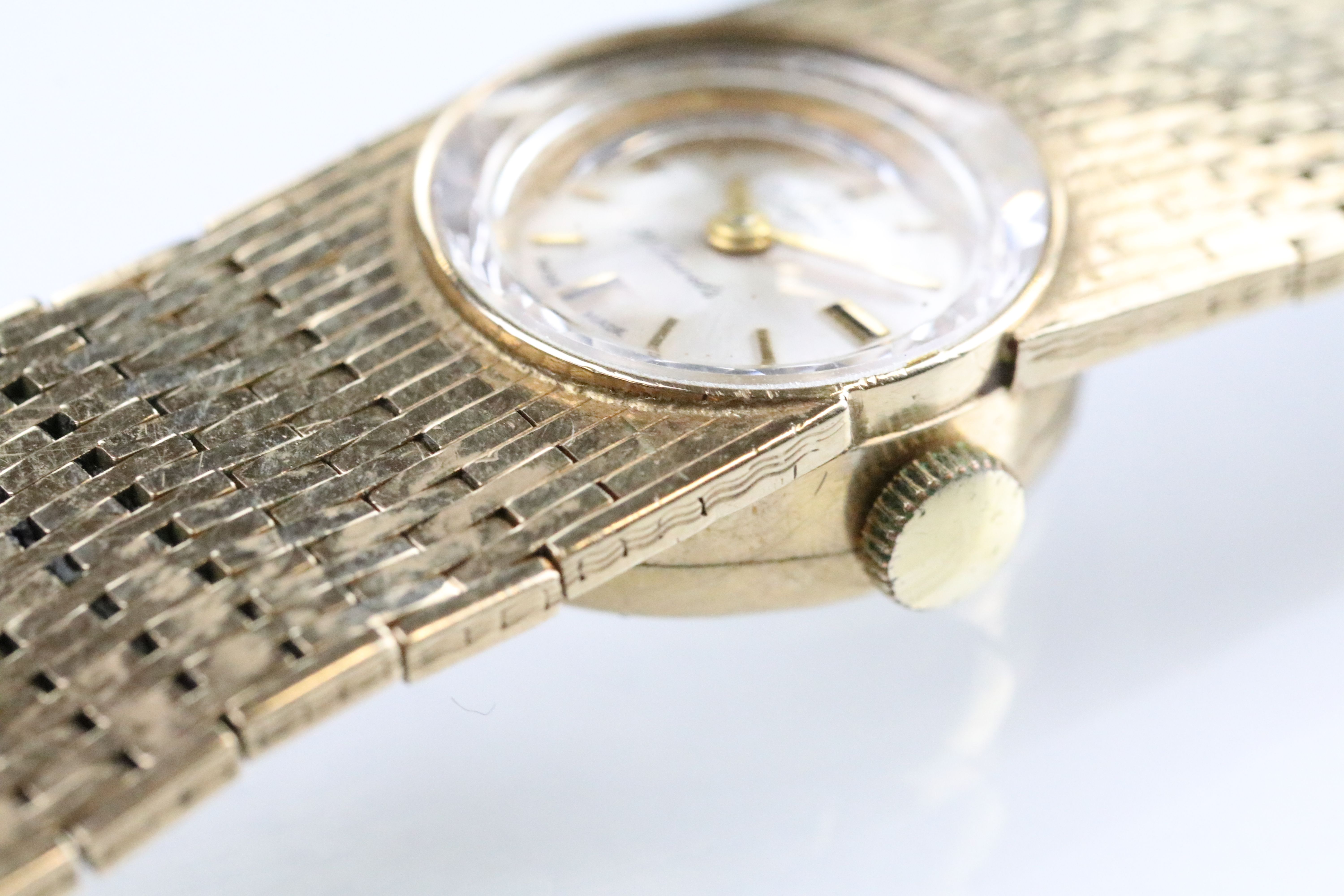 Rotary 9ct gold wrist watch having a round face with baton markers to the chapter ring and faceted - Image 5 of 9