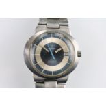 Omega Geneve Dynamic wrist watch having a round blue and white face with baton markers, dater