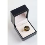 Hallmarked 9ct gold smoky quartz dress ring. The ring being set with a large round cut smoky