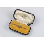 15ct gold aquamarine and pearl bar brooch. The brooch having a central millegrain set aquamarine