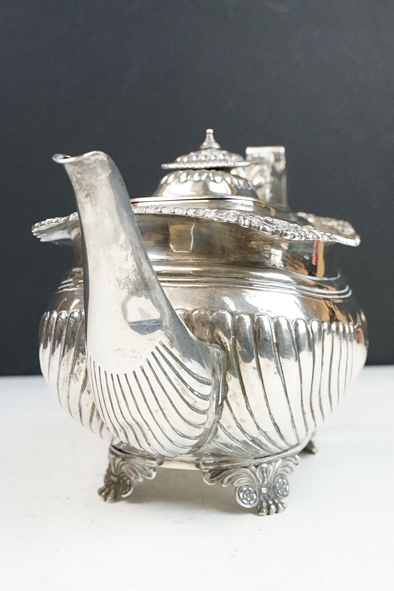 19th Century George III silver hallmarked teapot having a moulded shell and acorn borders, gadrooned - Image 8 of 12