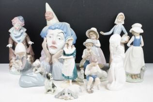 Collection of porcelain figures to include Lladro & Nao examples, featuring Lladro Jester Sad