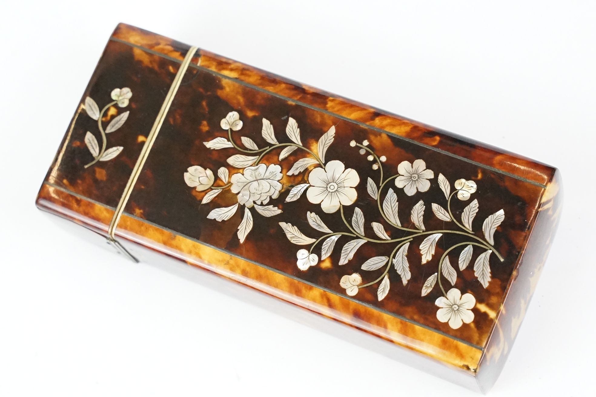 An early 20th century tortoiseshell spectacle case with mother of pearl floral decoration. - Image 2 of 6