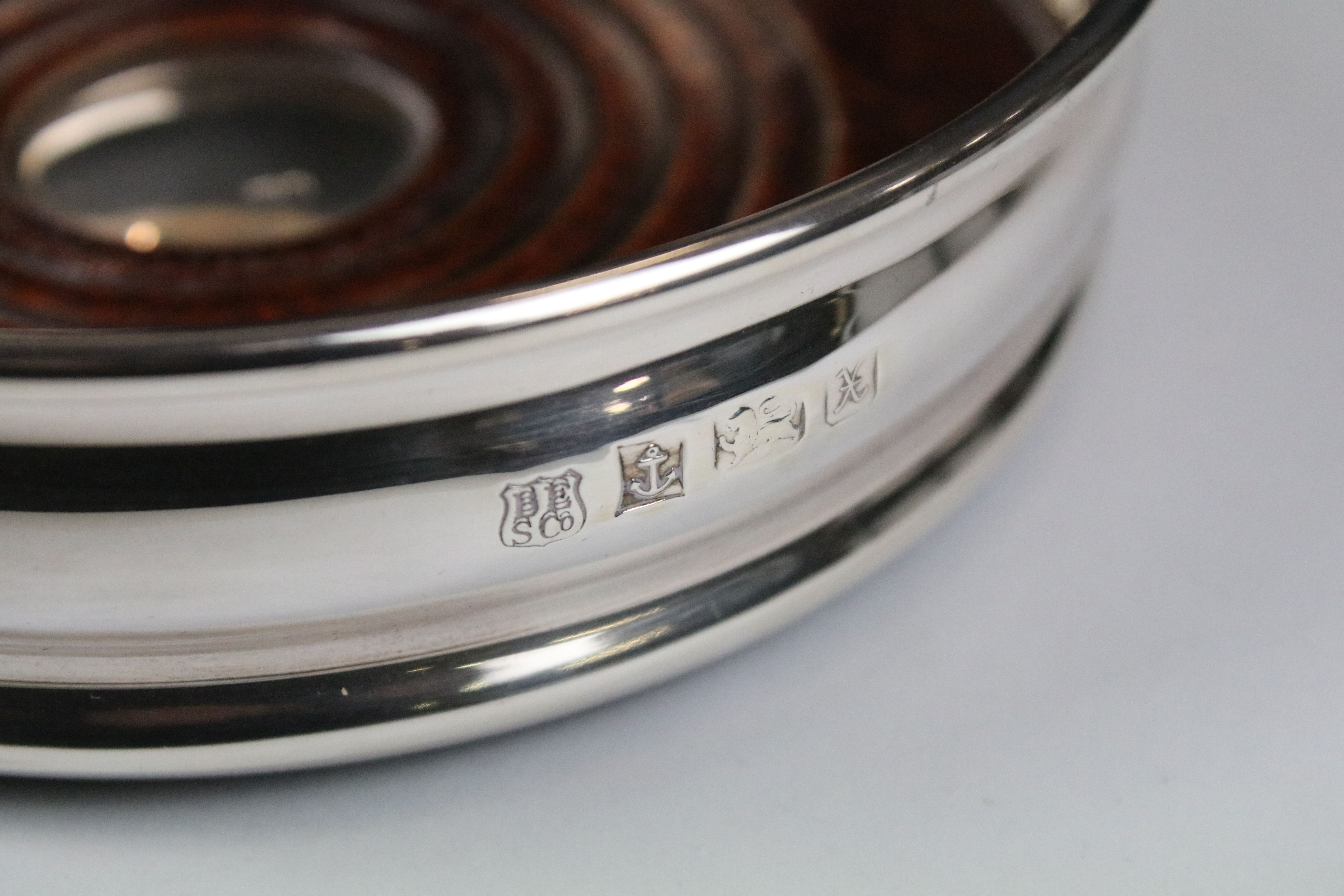 A fully hallmarked sterling silver bottle coaster, assay marked for Birmingham. - Image 5 of 6