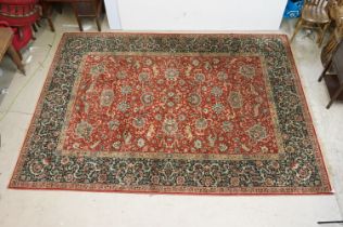 Large red and blue ground carpet, 345 x 252cm
