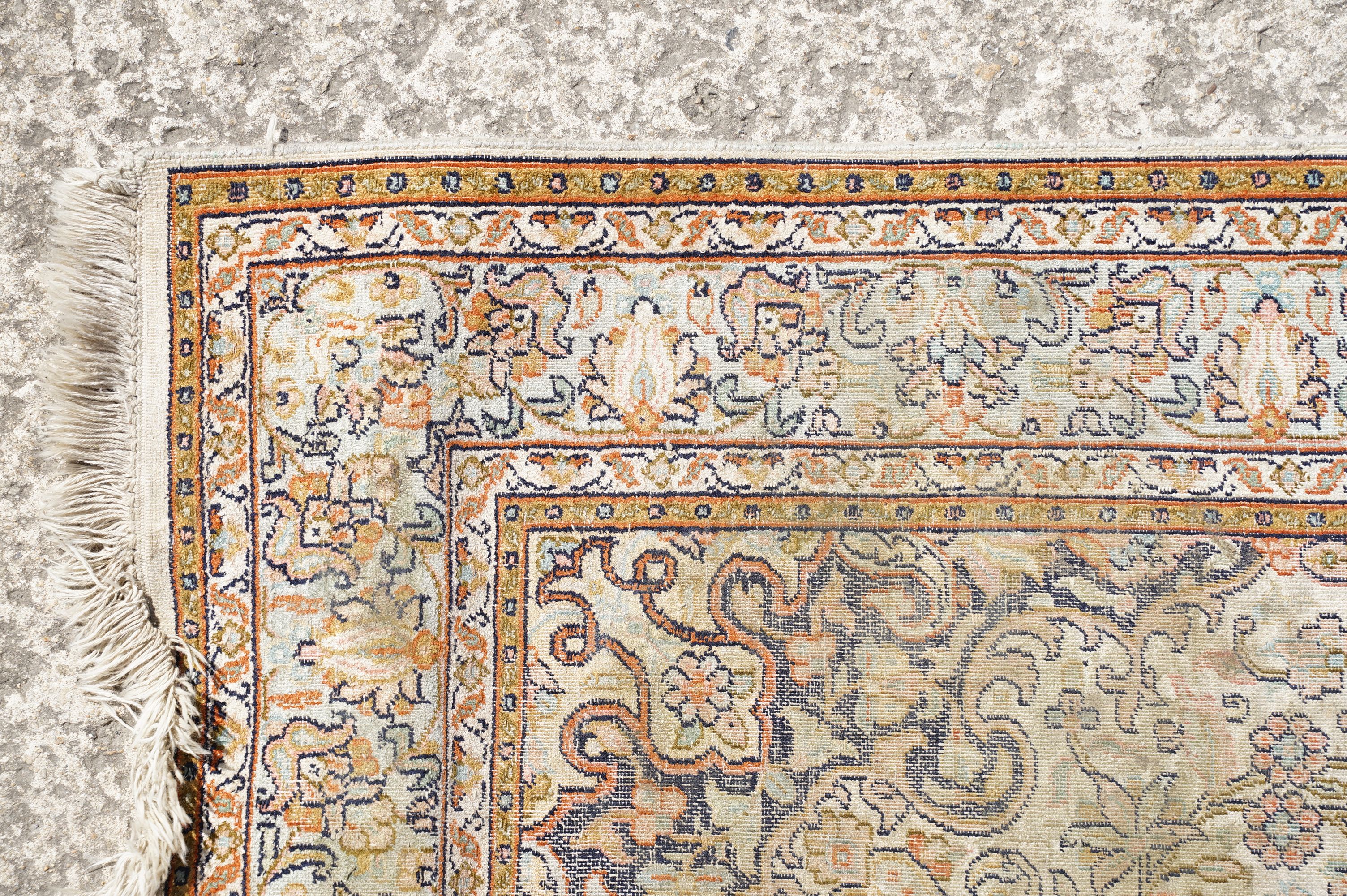 Middle Eastern cream ground carpet, with central stylised motif within geometric borders, 160 x 92cm - Image 4 of 14