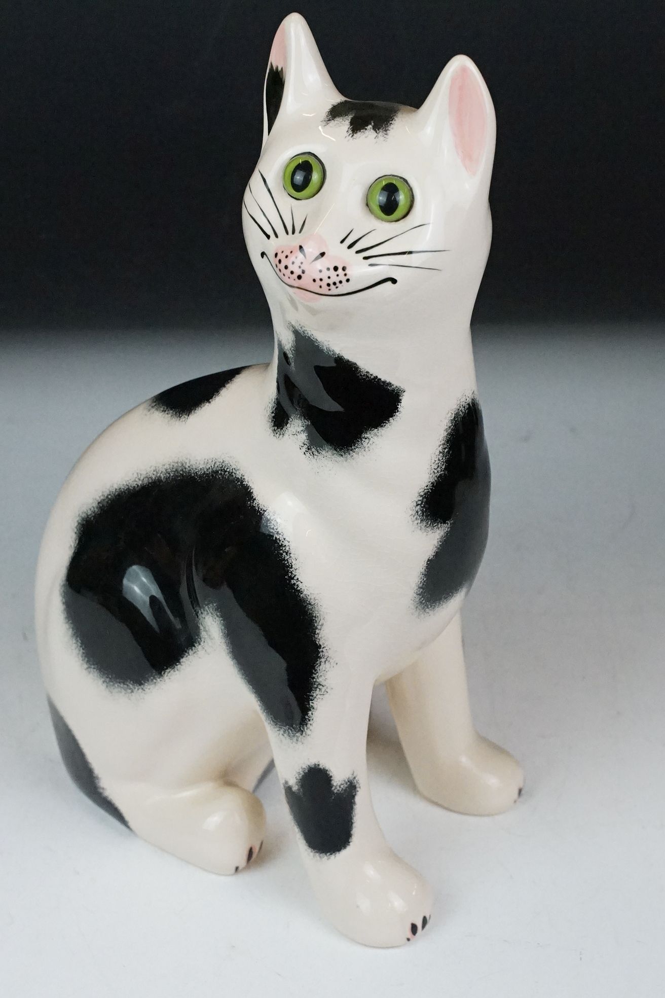 Griselda Hill Pottery Wemyss black and white cat, signed G. Hill Pottery to base and Wemyss, 34cm