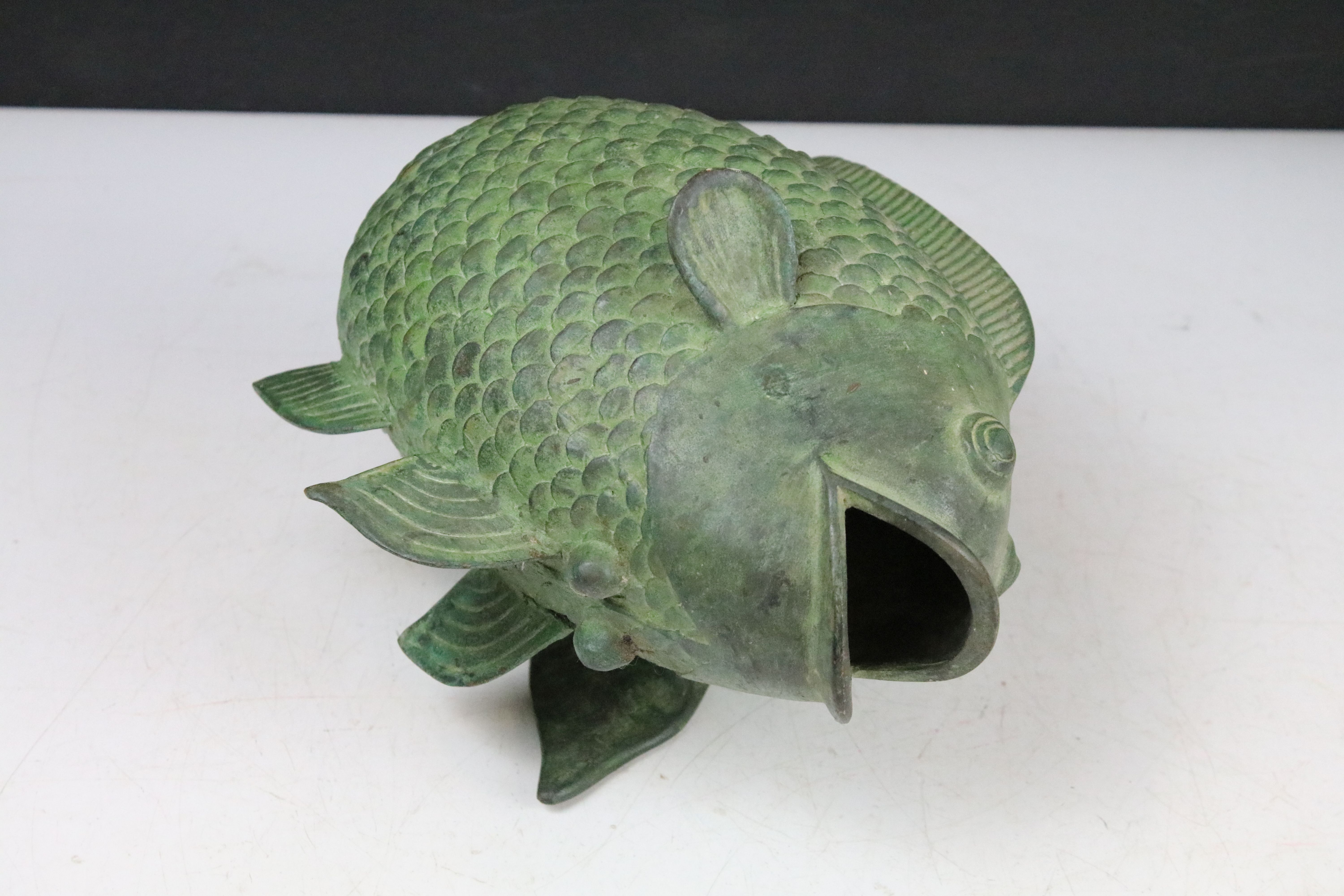 Bronze model of a koi carp, together with a Hong Kong ceramic figure, carved soapstone ornament, and - Image 5 of 5