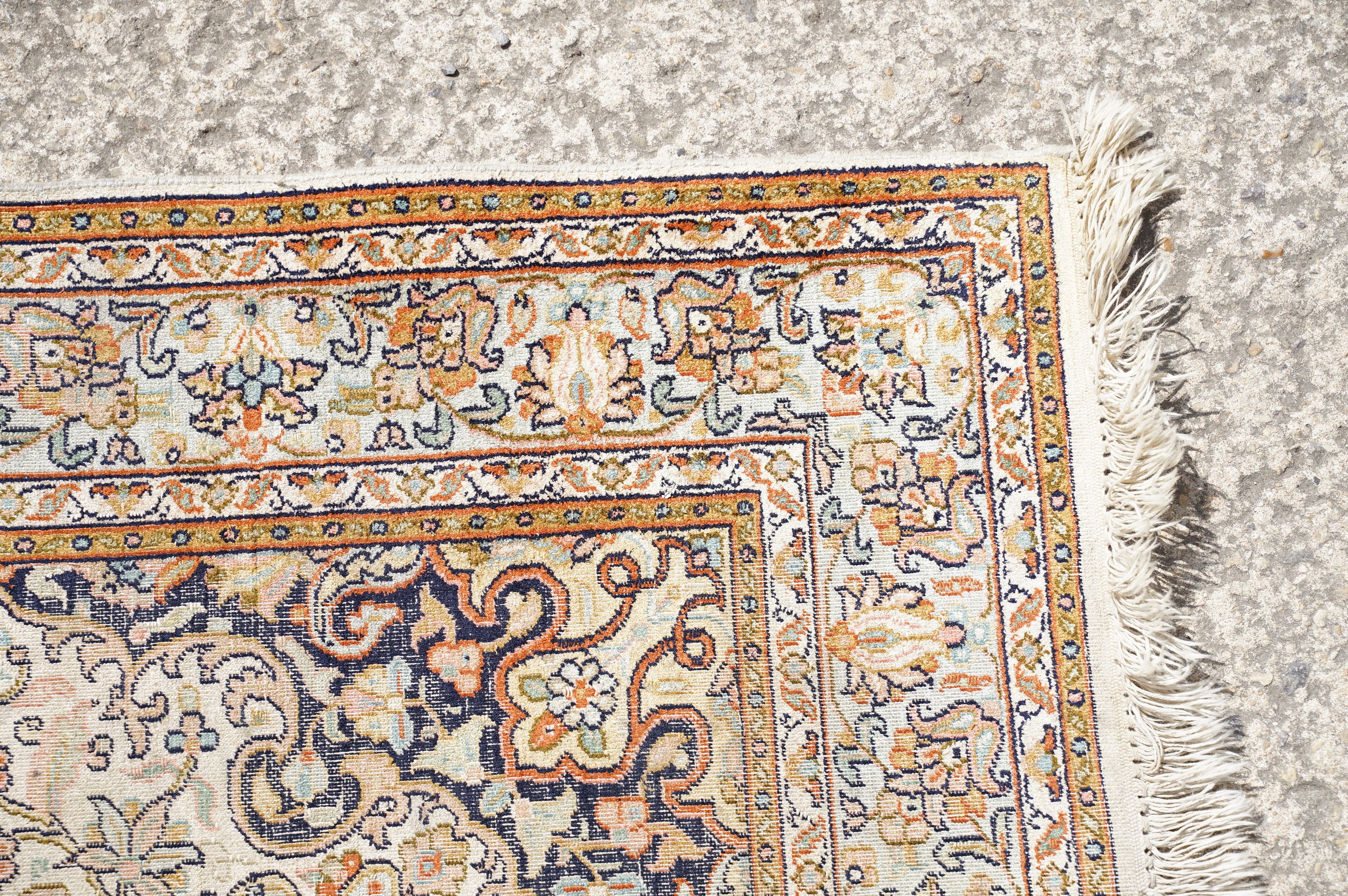 Middle Eastern cream ground carpet, with central stylised motif within geometric borders, 160 x 92cm - Image 5 of 14