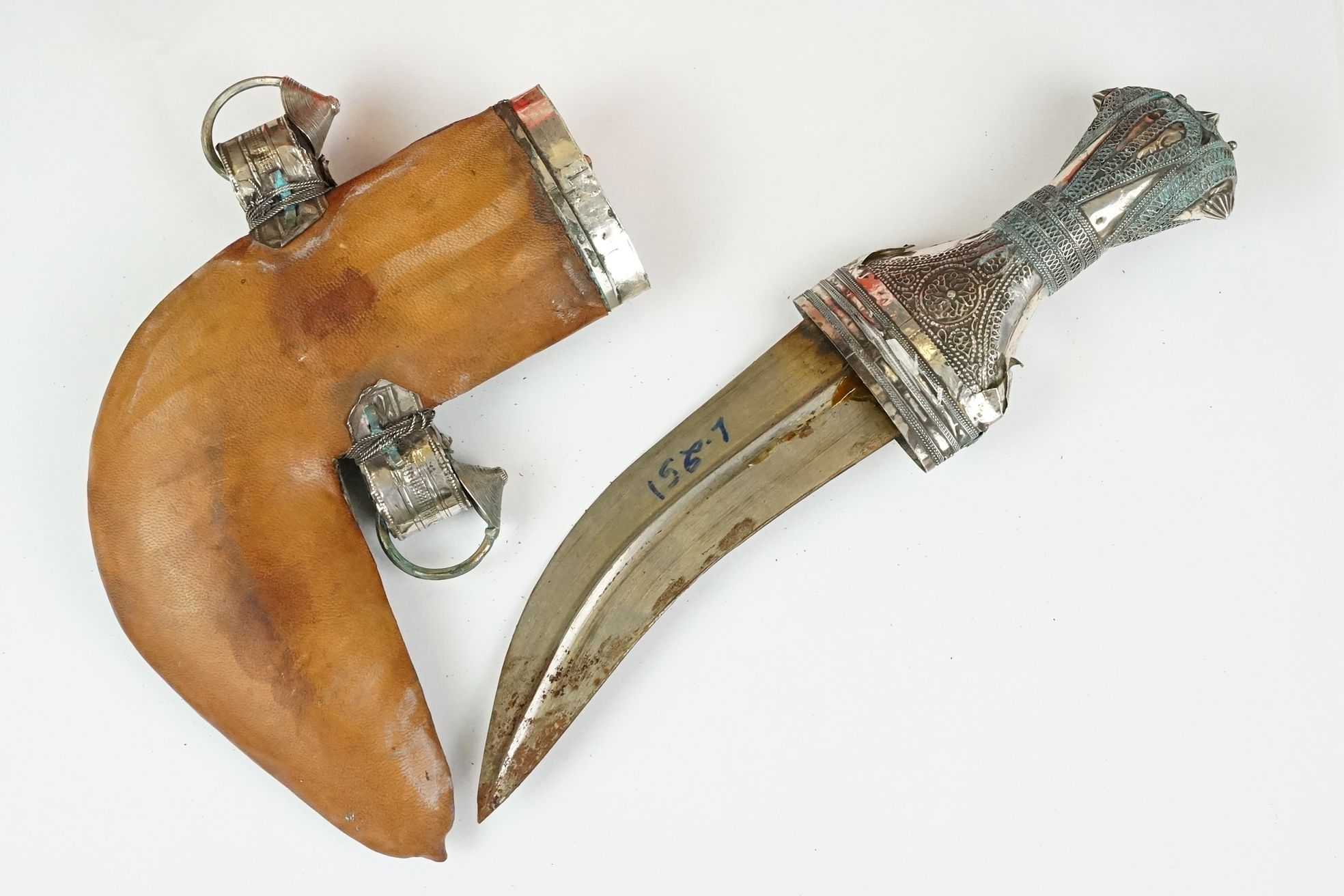 A late 19th / early 20th century Yemin silver mounted over leather sheath Jambiya. - Image 2 of 9