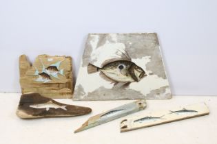 Five oil paintings of fish on wood, to include a painting of a trout on driftwood (driftwood