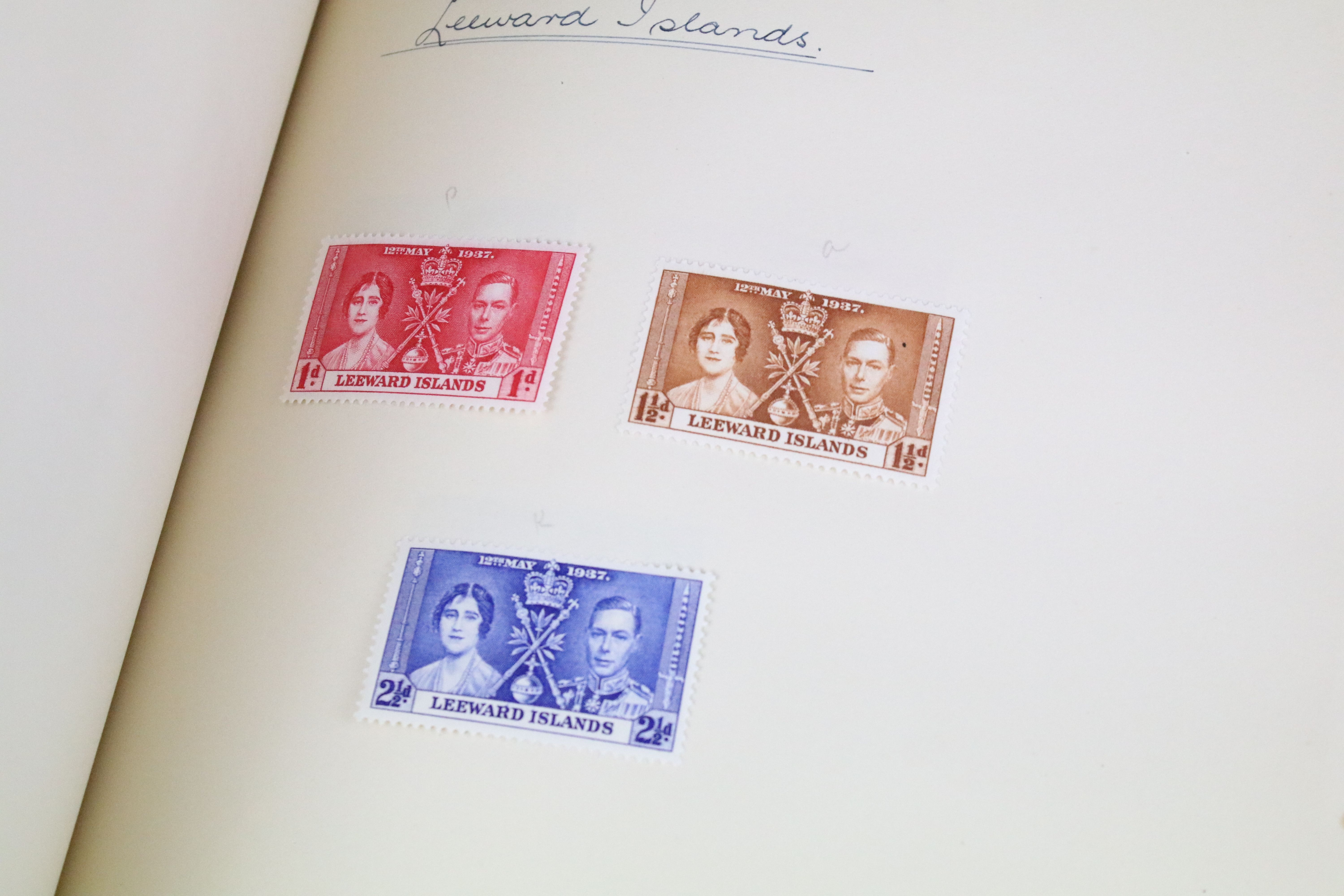 A stamp album containing stamps marking the silver jubilee of King George V from the UK and - Image 11 of 18