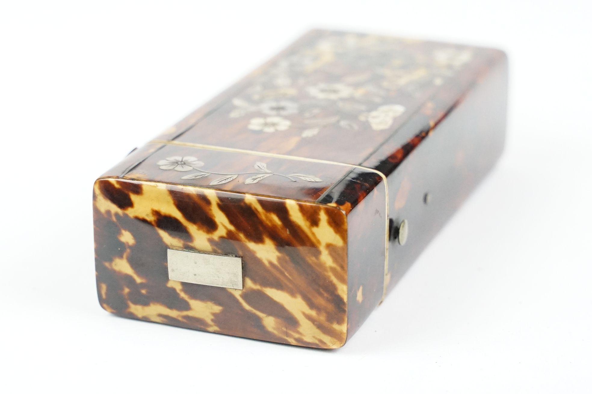 An early 20th century tortoiseshell spectacle case with mother of pearl floral decoration. - Image 4 of 6