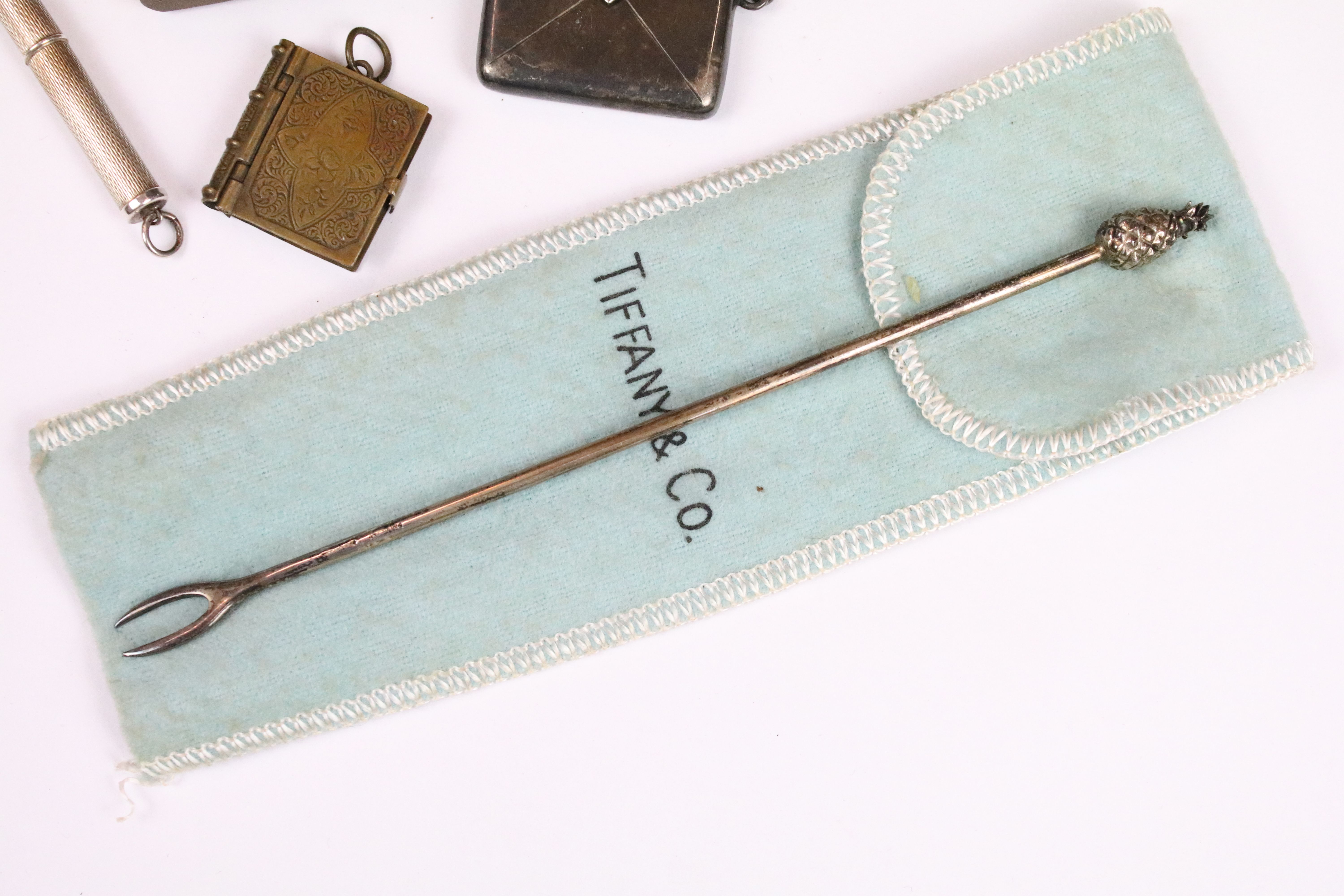 Silver vesta case, Chester 1919, a silver propelling drill, a Tiffany sterling olive fork, a - Image 2 of 6