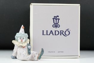 Boxed Lladro ' Pequeno Pierrot Cansado / Tired Friend ' porcelain figure, no. 05812