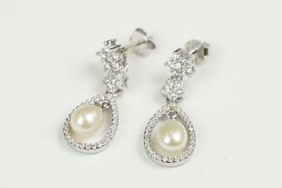 Pair of silver and pearl drop earrings