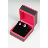 Pair of 18ct white gold ruby and diamond clover leaf style stud earrings
