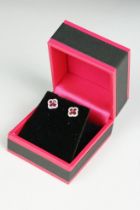 Pair of 18ct white gold ruby and diamond clover leaf style stud earrings