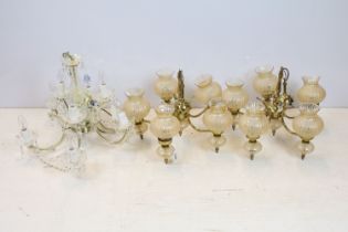 Pair of brass five branch ceiling light fittings with bubbled effect amber glass shades (light
