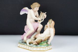 Meissen figure of an angel playing a lyre and a mermaid, blue crossed swords mark to base, incised