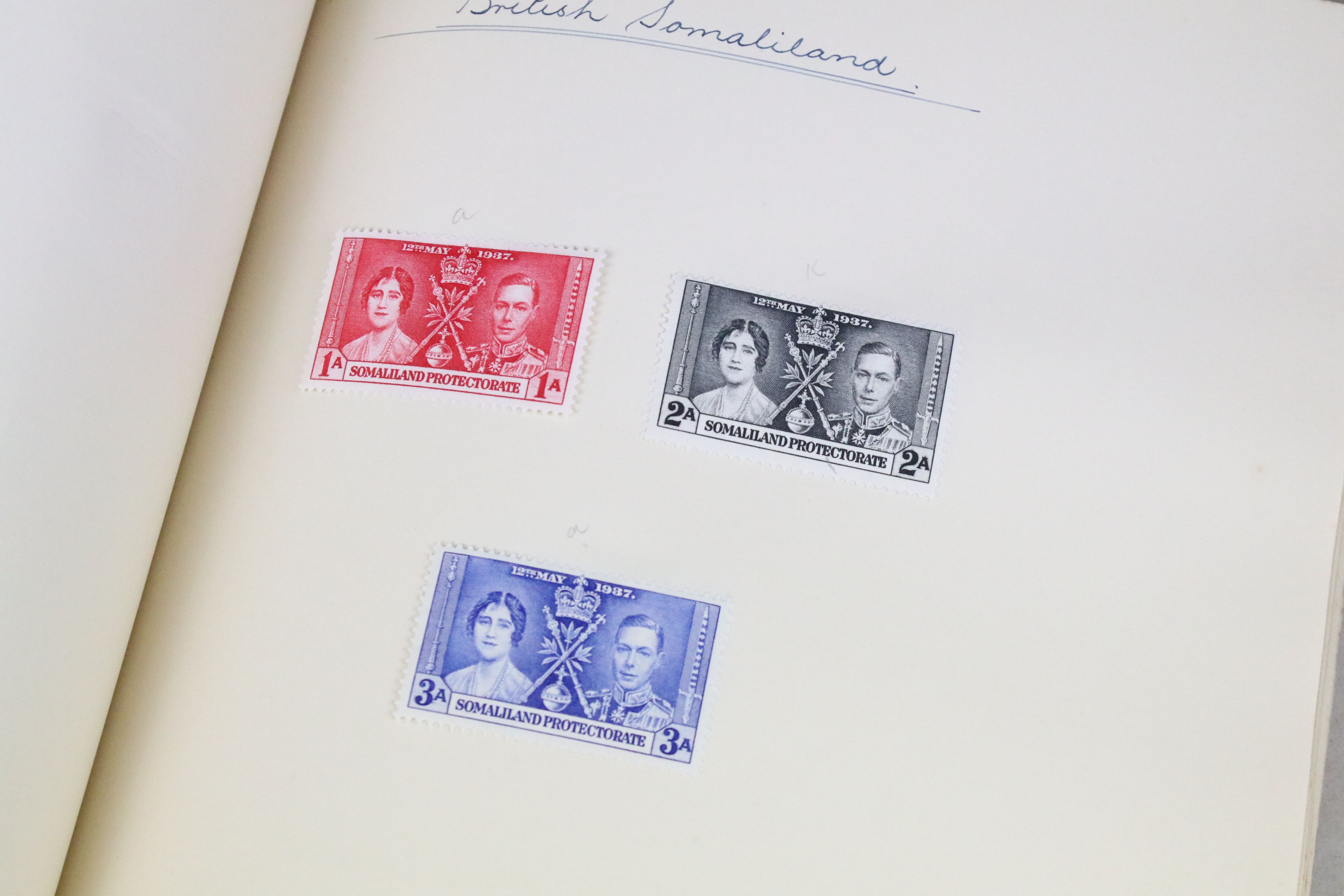 A stamp album containing stamps marking the silver jubilee of King George V from the UK and - Image 10 of 18