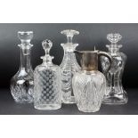 Cut glass claret jug, with silver mounts, hallmarked London, 1903, 22cm high, a cut glass decanter