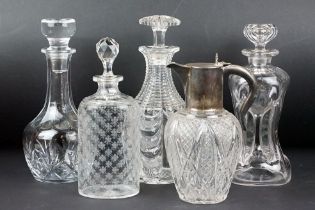 Cut glass claret jug, with silver mounts, hallmarked London, 1903, 22cm high, a cut glass decanter