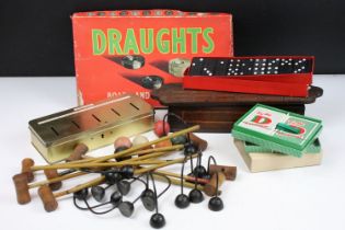 A group of vintage toys and games to include draughts, dominoes and a table top croquet set.