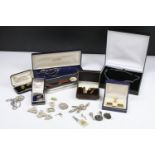 A small collection of vintage and contemporary costume jewellery to include silver examples.