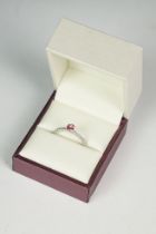 Platinum set pink sapphire and diamond ring