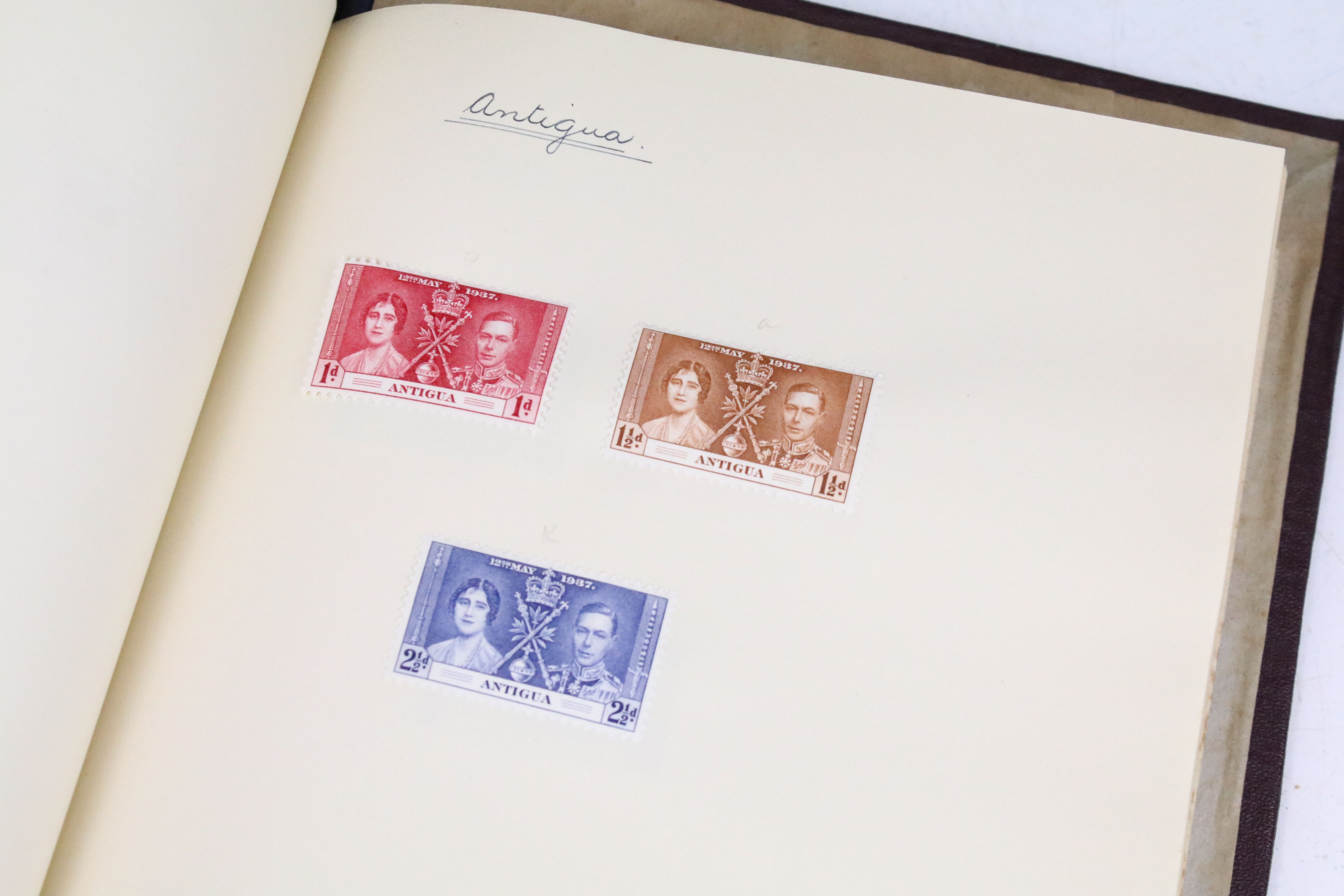 A stamp album containing stamps marking the silver jubilee of King George V from the UK and - Image 8 of 18