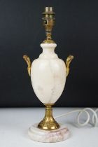 Marble table lamp of baluster form, with gilt metal mounts and twin handles, raised on a circular