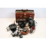 Collection of cameras, lenses & binoculars within a leather case, the lot featuring Olympus FTL (