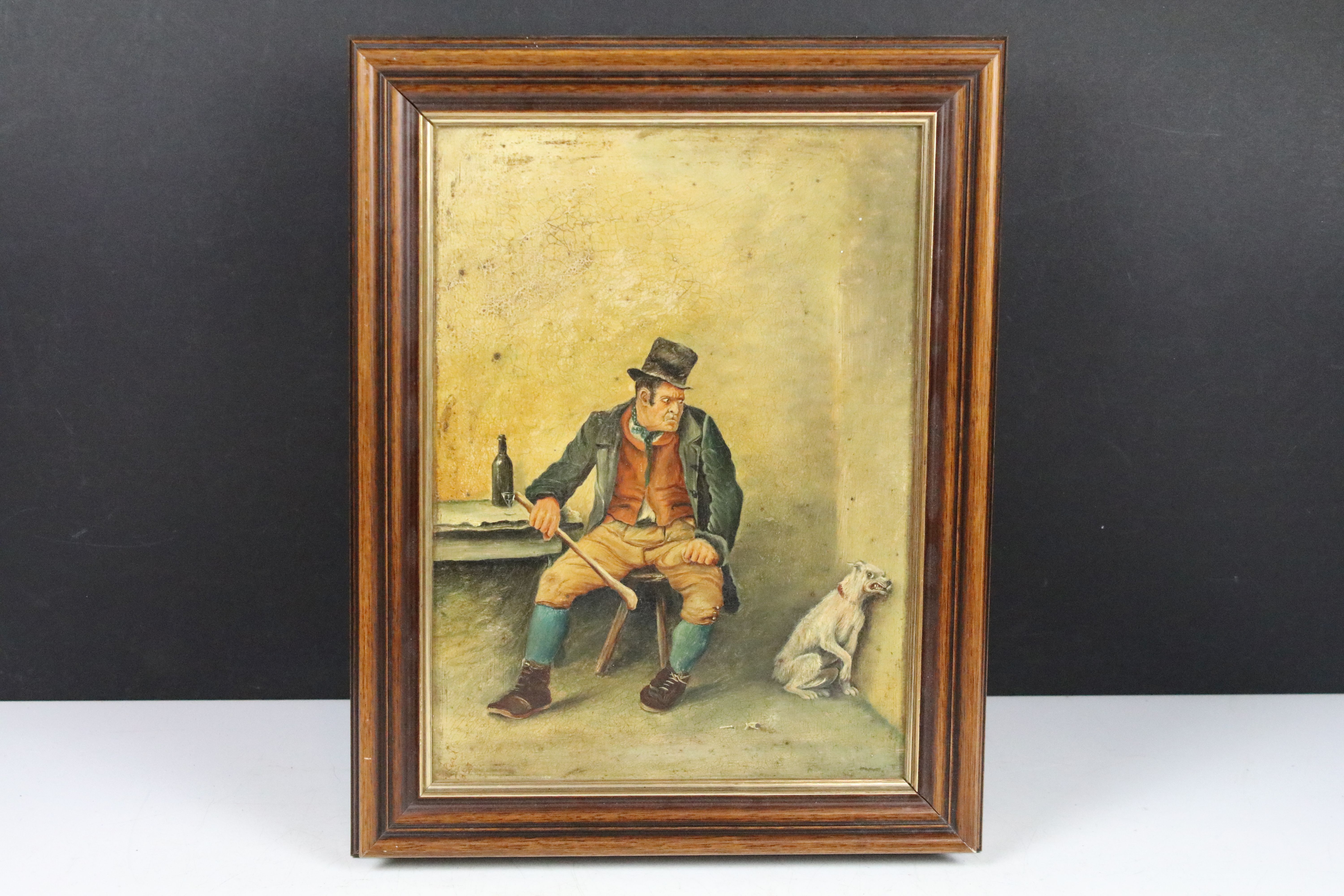 19th century English School, portrait of a man with a cowering dog, oil on board, signed