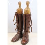 Pair of John Lobb laced leather riding boots with wooden trees