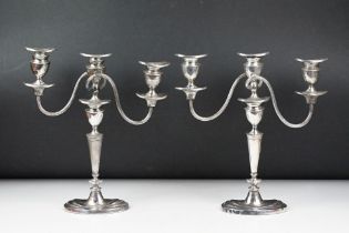 Pair of silver plated three branch candelabra, each 29cm high
