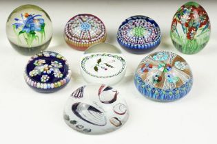 Collection of eight paperweights, including: three Perthshire Paperweights, Crieff, Scotland, each