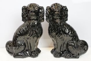 Pair of black cats in Staffordshire style, 35cm high