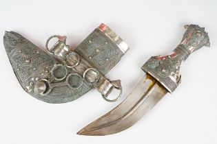 A late 19th / early 20th century Yemin silver mounted over leather sheath Jambiya.