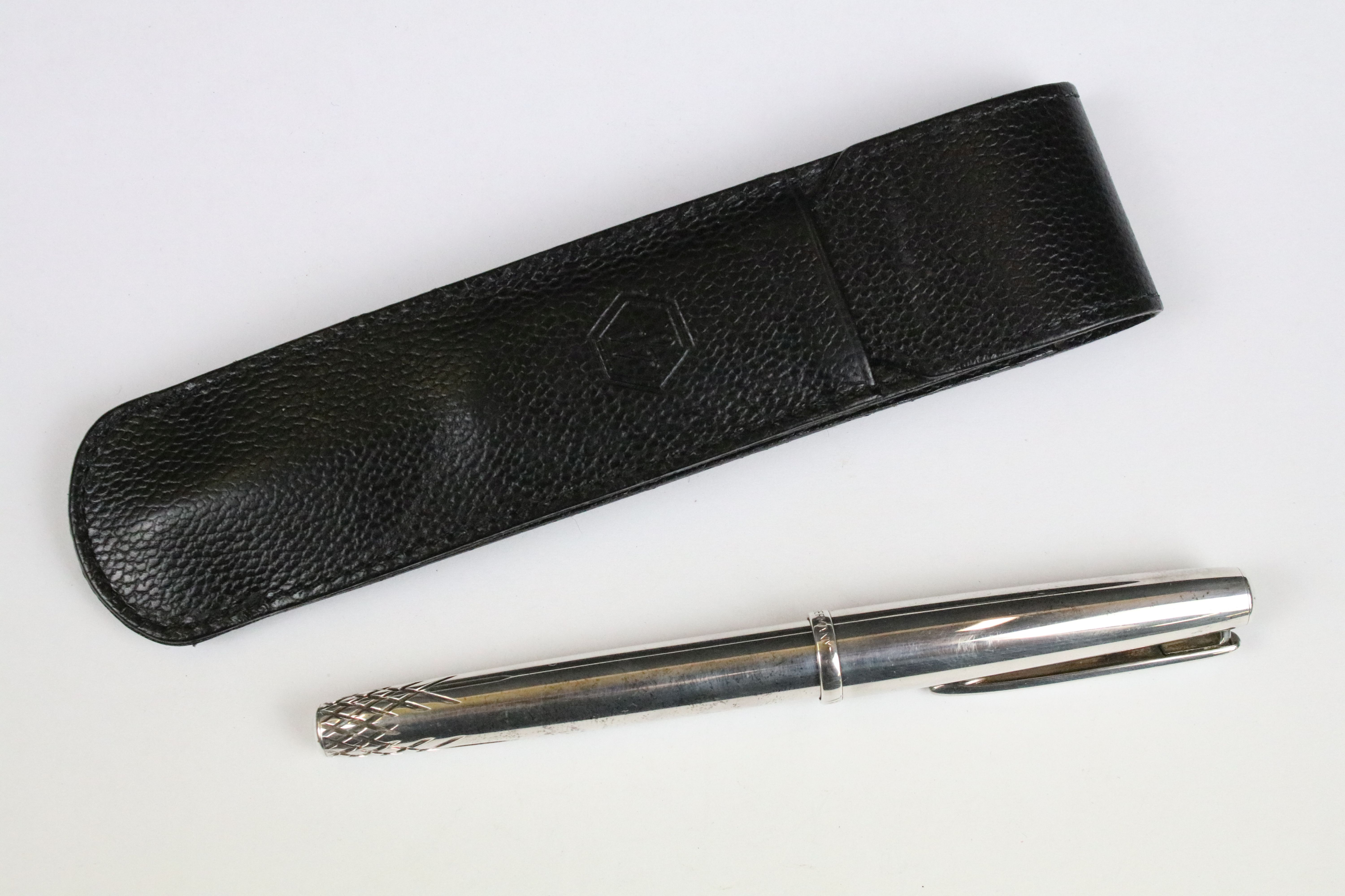 A white metal Waterford fountain pen with 18ct gold nib within Waterman leather case.