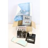 The Beatles Anthology, The Beatles - Unseen Archives, and a Beatles mug, together with a group of