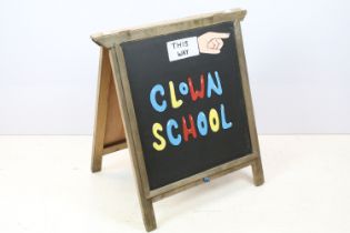 Circus style clown painted sandwich board, ' This Way Clown School ' and ' This Way ' verso, 76 x