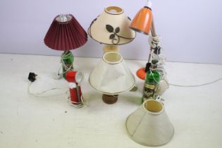 Collection of six table lamps to include two glass Glenfiddich whisky bottle lamps, anglepoise,