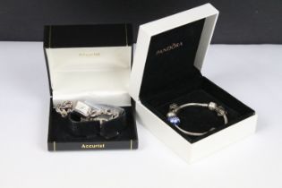 A boxed Pandora charm bracelet with charms together with a ladies Accurist watch.
