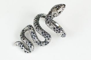A ladies silver dress ring in the the form of a snake, marked 925 to the inner shank.