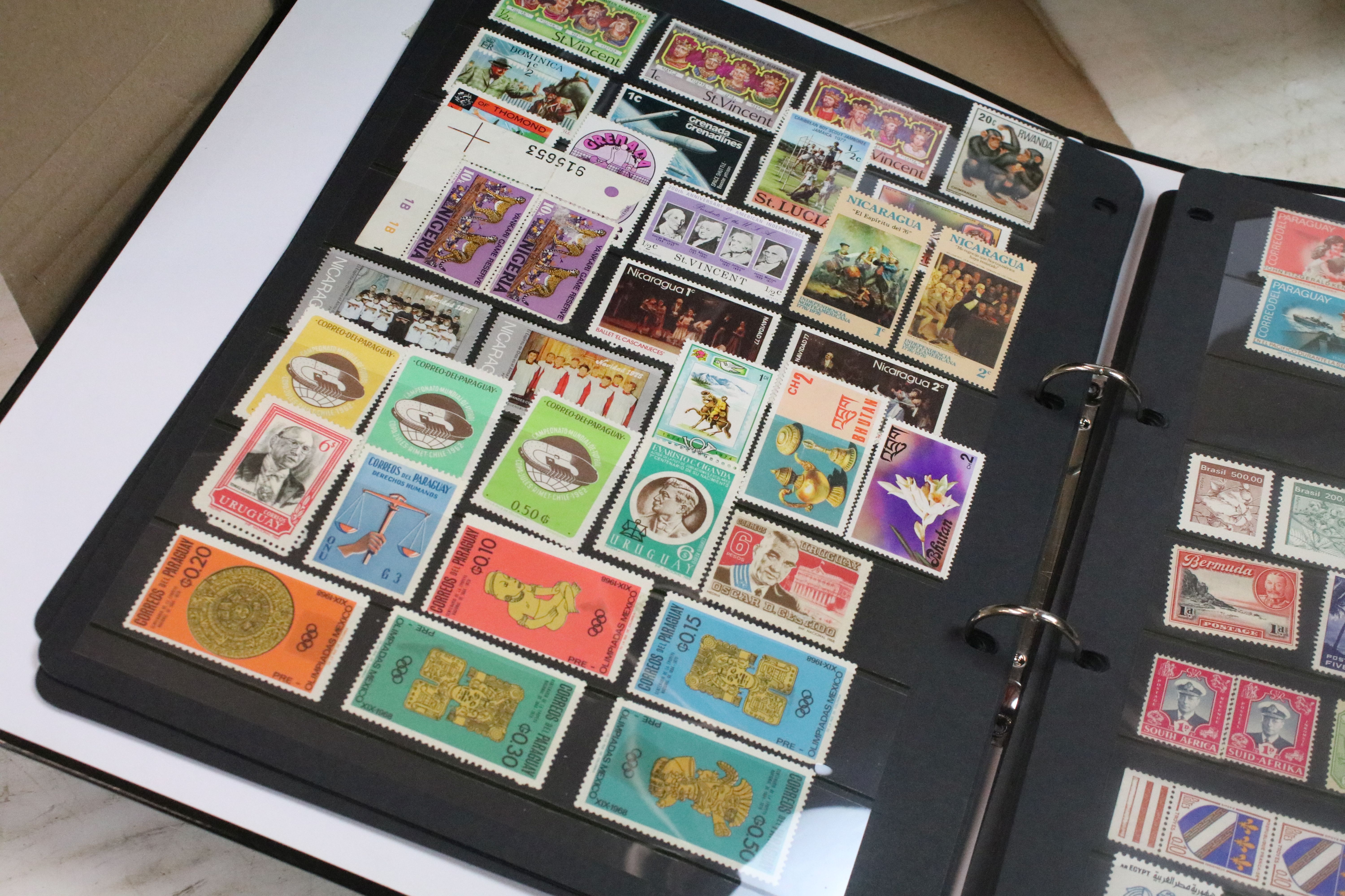 A collection of British and world stamps within albums together with loose examples - Image 15 of 20