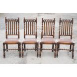 Set of four oak dining chairs with barley twist supports and carved crown details to backs, with
